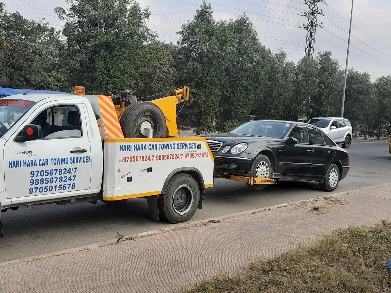 Luxury car transported on a flatbed